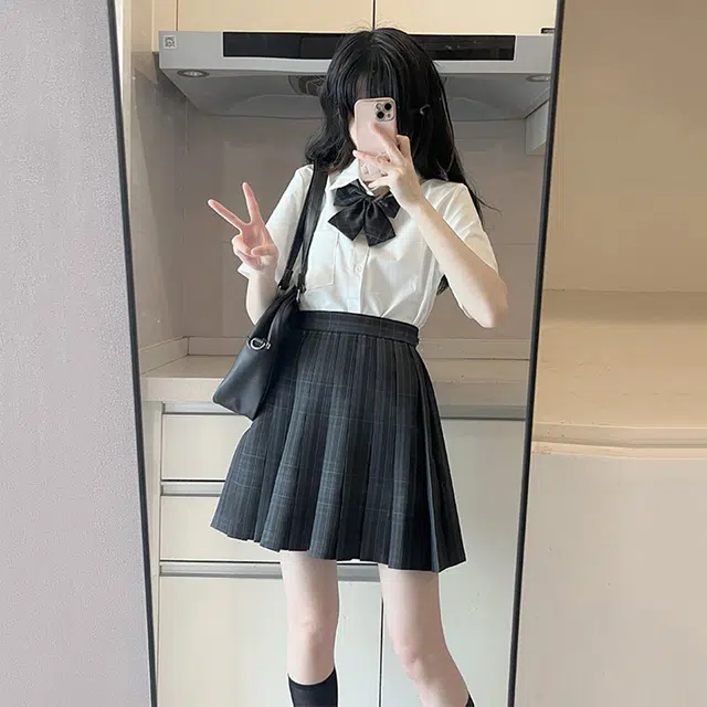 日暮星河 暗黑系学院风辣妹舒适格子短款休闲短裙 女款