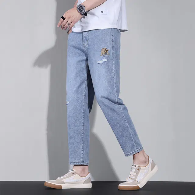 么宁 星星字母刺绣设计感简约百搭修身直筒潮流时尚舒适透气个性痞帅弹力九分破洞牛仔裤 男女同款