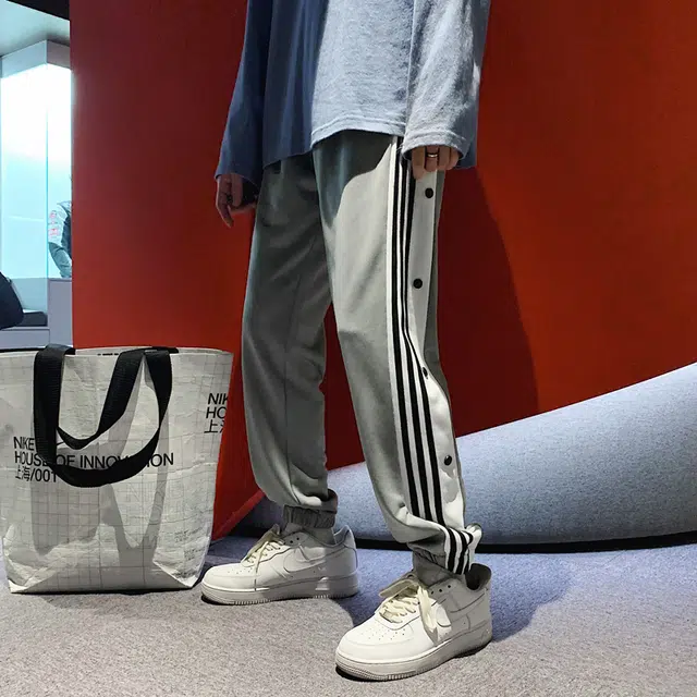 么宁 侧边条纹纽扣装饰设计感舒适透气潮流时尚简约百搭个性痞帅束脚休闲裤 男女同款