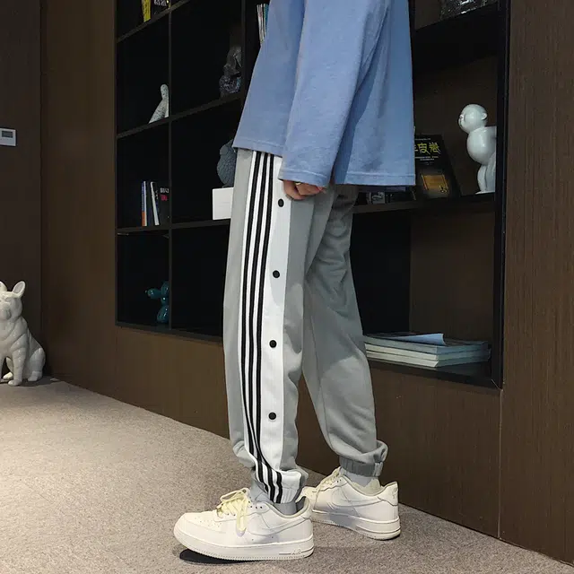 么宁 侧边条纹纽扣装饰设计感舒适透气潮流时尚简约百搭个性痞帅束脚休闲裤 男女同款