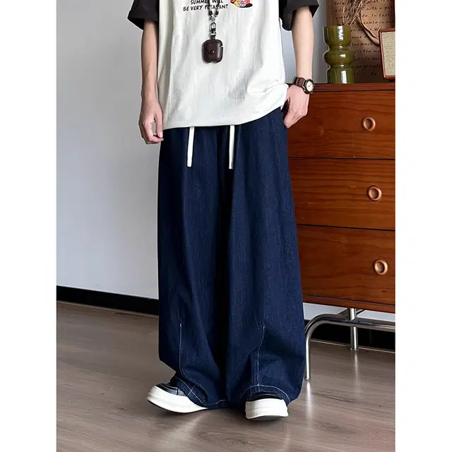 如续 潮流简约高级感纯色宽松阔腿弯刀长裤百搭设计感舒适休闲牛仔裤 男女同款