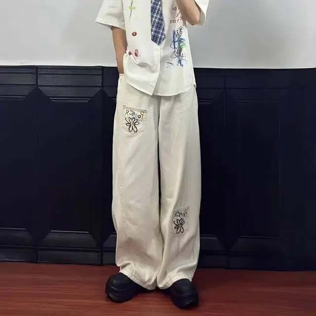 如续 美式解构花卉印花弯刀裤设计感阔腿情侣工装裤子牛仔裤 男女同款