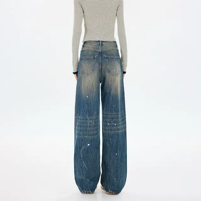 如续 美式做旧图案设计纽扣宽松褶皱斑点拖地牛仔裤 男女同款