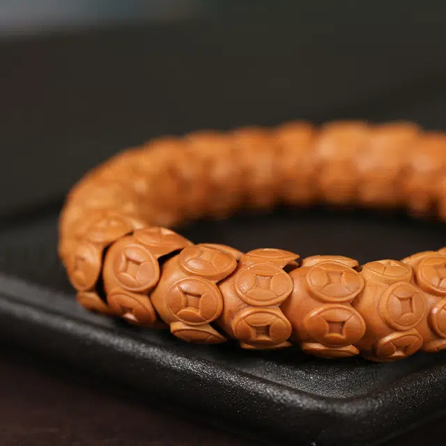 镯钰瑭 招财进宝玄学 盘玩新中式国潮时尚民族风高级感满满 事业有成 节节高升 学业顺利 #好运 橄榄核 手串 男女同款情侣款