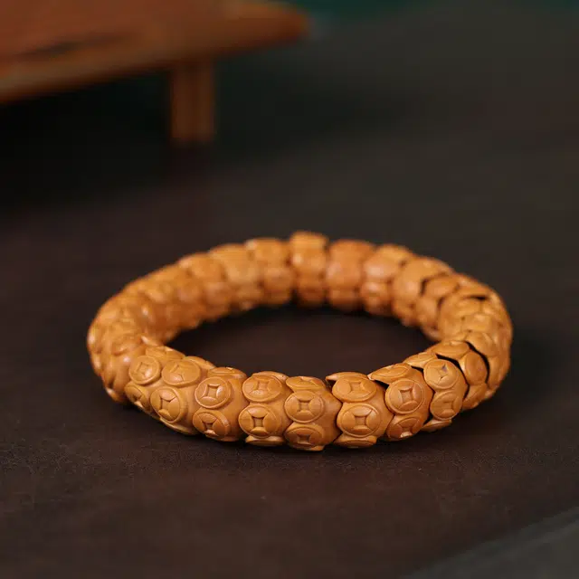 镯钰瑭 招财进宝玄学 盘玩新中式国潮时尚民族风高级感满满 事业有成 节节高升 学业顺利 #好运 橄榄核 手串 男女同款情侣款