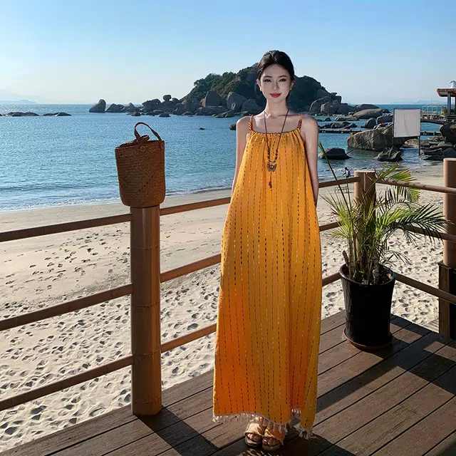 小菊川栗 舒适休闲简约百搭时尚纯色修身吊带连衣裙 女款 黄色