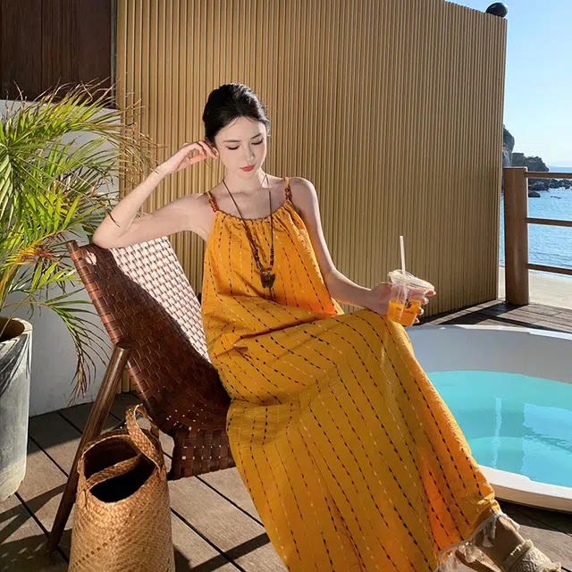 小菊川栗 舒适休闲简约百搭时尚纯色修身吊带连衣裙 女款 黄色