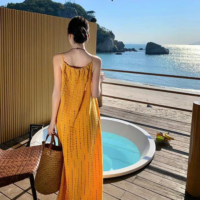 小菊川栗 舒适休闲简约百搭时尚纯色修身吊带连衣裙 女款 黄色