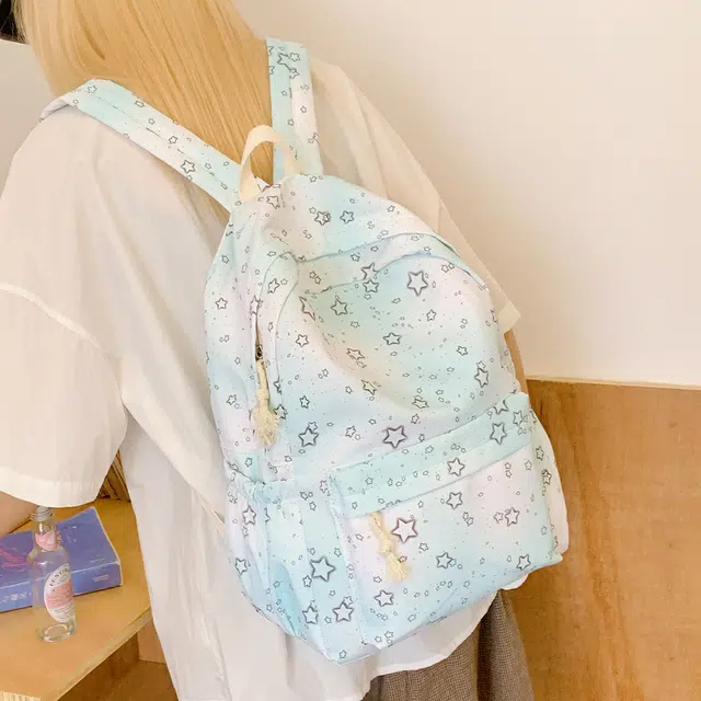 雅鹿 日韩系薄荷曼波渐变色炫彩星星印花大容量初高中大学生书包轻便可爱少女感防泼水旅行背包 尼龙布 双肩包 女款 浅蓝色
