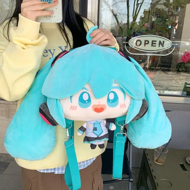 雅鹿 卡通可爱初音未来人物娃偶大容量大头玩偶简约小众不撞款二次元百搭出行旅游背包 毛绒 双肩包 女款 蓝色