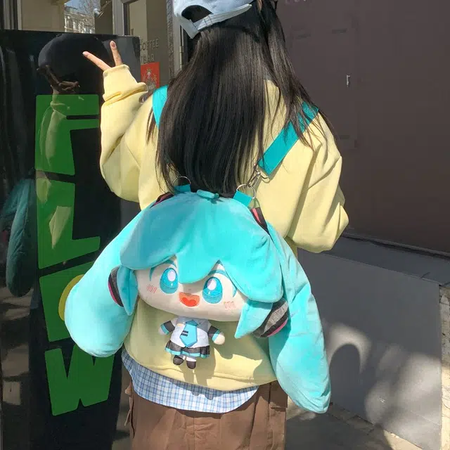 雅鹿 卡通可爱初音未来人物娃偶大容量大头玩偶简约小众不撞款二次元百搭出行旅游背包 毛绒 双肩包 女款 蓝色