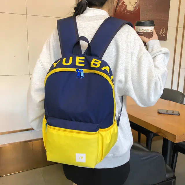 雅鹿 美式撞色顶字母印花初高中大学生书包可爱休闲大感校园旅行 尼龙 双肩包 男女同款情侣款 黄色/蓝色/红色/粉色