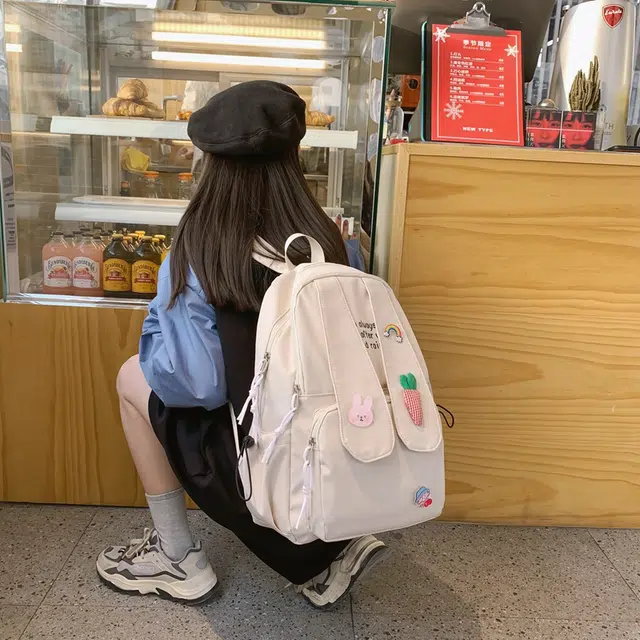 雅鹿 纯色卡通兔耳朵休闲轻便百搭可爱徽章拉链开合 尼龙 双肩包 女款 米白色/黑色/粉红色