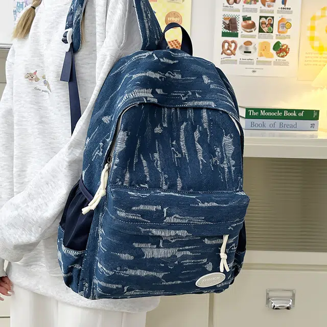 雅鹿 韩系水洗做旧破洞小众设计感初高中大学生书包轻便百搭通勤运动电脑背包 牛仔布 双肩包 常规 男女同款情侣款 深蓝/蓝色/黑色