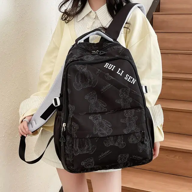 雅鹿 日韩系卡通可爱小熊简约轻便防泼水百搭旅行 尼龙 双肩包 男女同款情侣款 黑色/紫色/绿色/米色