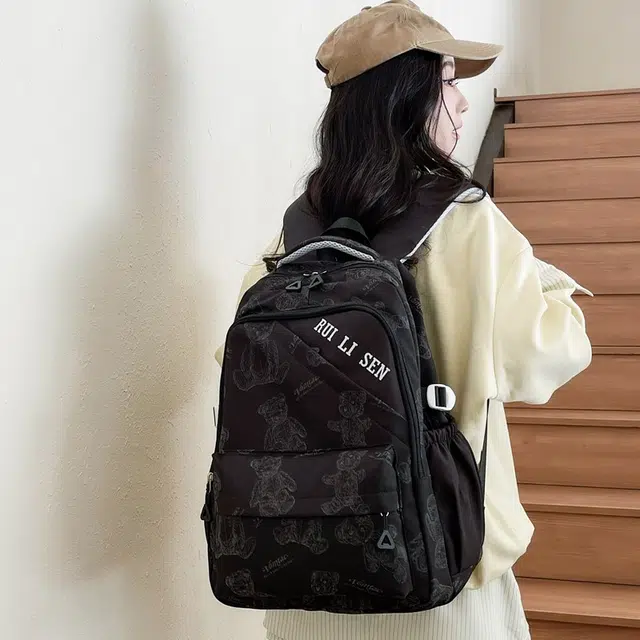 雅鹿 日韩系卡通可爱小熊简约轻便防泼水百搭旅行 尼龙 双肩包 男女同款情侣款 黑色/紫色/绿色/米色