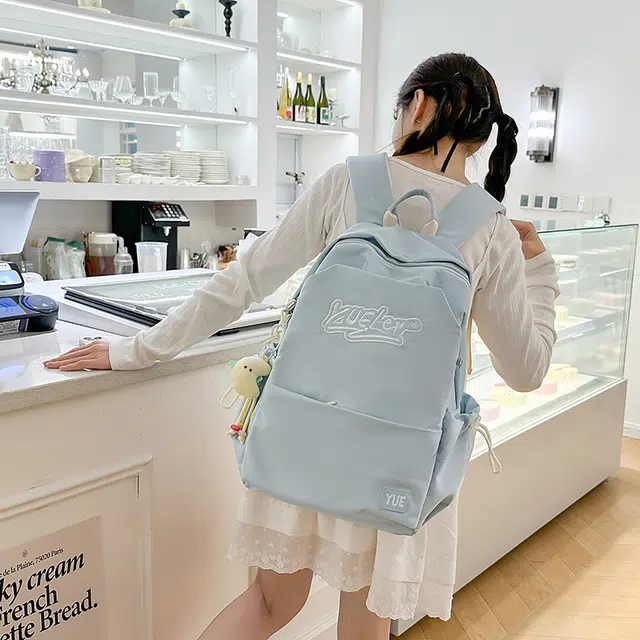 木木兔 超大容量书包女初中生减负高中生 小学生轻便背包 经典时尚小众设计 高级感 休闲拉链开合  尼龙布 双肩包 常规 米白色