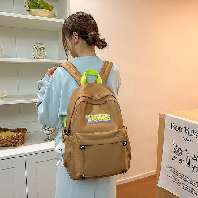 木木兔 轻便减压书包女高中生大容量减负初中小学生  经典时尚小众设计 高级感 休闲拉链开合  牛津纺 双肩包 常规 黑色