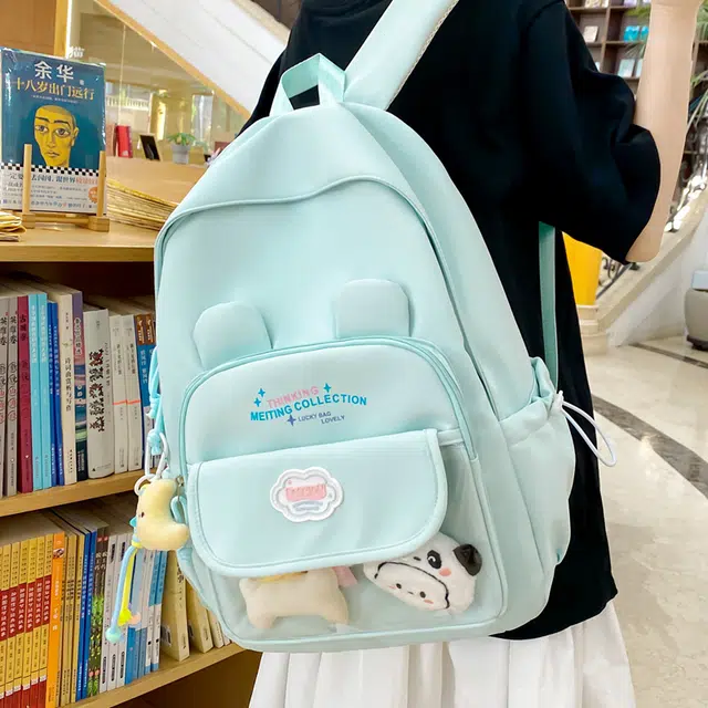 木木兔 书包女高中生轻便减负大容量初中生小学生  经典时尚小众设计 高级感 休闲拉链开合 尼龙布 双肩包 常规 米白色
