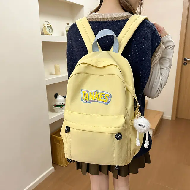 木木兔 轻便减压书包女高中生大容量减负初中小学生  经典时尚小众设计 高级感 休闲拉链开合  牛津纺 双肩包 常规 黑色