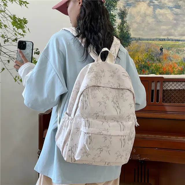 木木兔 书包女小学生轻便减负超大容量初中生 经典时尚小众设计 高级感 休闲拉链开合 尼龙布 双肩包 中号 米白色