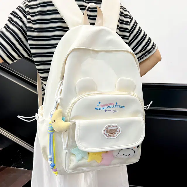木木兔 书包女高中生轻便减负大容量初中生小学生  经典时尚小众设计 高级感 休闲拉链开合 尼龙布 双肩包 常规 米白色