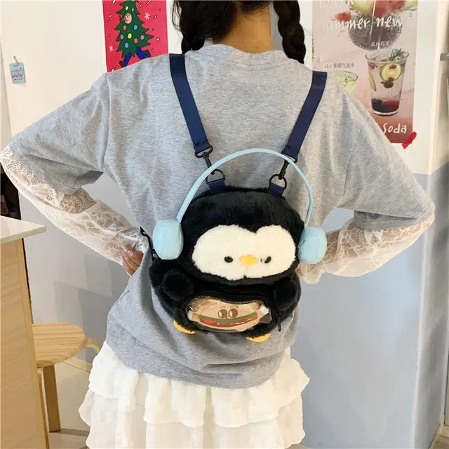 木木兔 书包女小学生轻便 初中生超大容量 高中生包包 高颜值 经典时尚小众设计 高级感 休闲拉链开合 牛津纺 双肩包 常规 企鹅