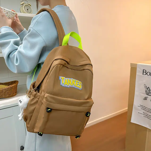 木木兔 轻便减压书包女高中生大容量减负初中小学生  经典时尚小众设计 高级感 休闲拉链开合  牛津纺 双肩包 常规 黑色
