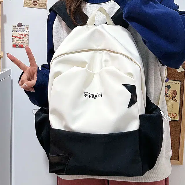 木木兔 书包女生初中生超大容量中学生高中小学生轻便减负  经典时尚小众设计 高级感 休闲拉链开合 尼龙布 双肩包 常规 黄色