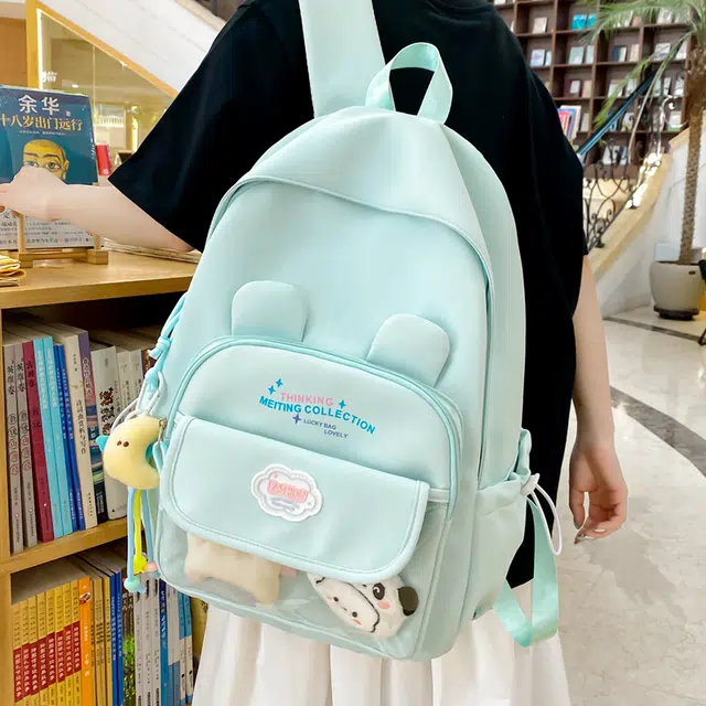 木木兔 书包女高中生轻便减负大容量初中生小学生  经典时尚小众设计 高级感 休闲拉链开合 尼龙布 双肩包 常规 米白色