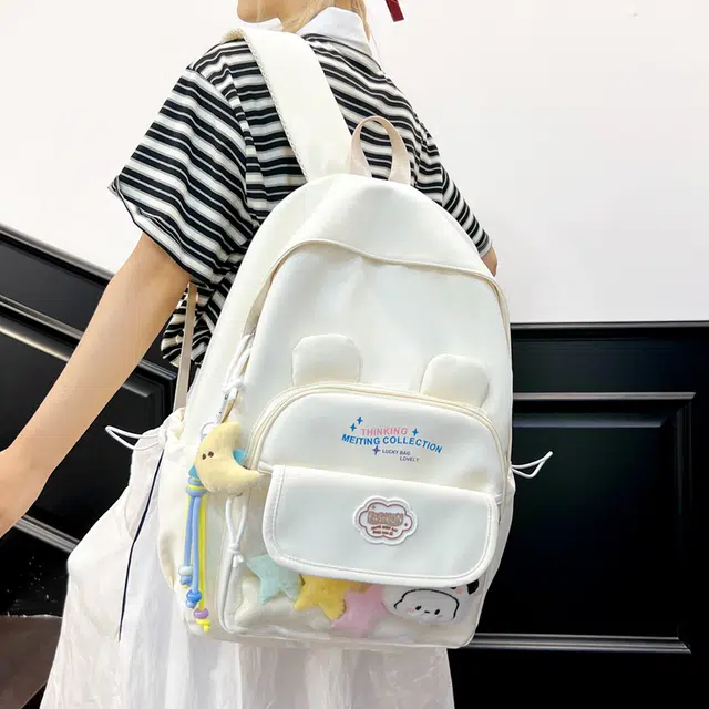 木木兔 书包女高中生轻便减负大容量初中生小学生  经典时尚小众设计 高级感 休闲拉链开合 尼龙布 双肩包 常规 米白色