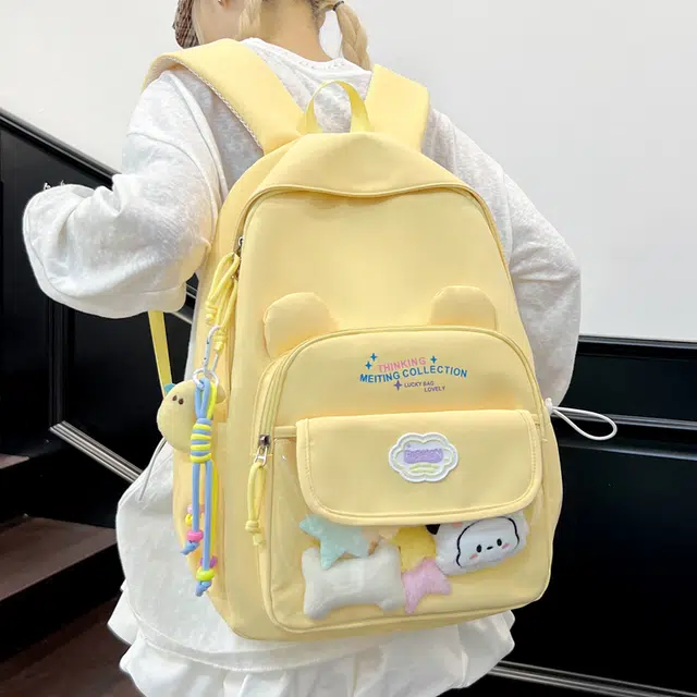 木木兔 书包女高中生轻便减负大容量初中生小学生  经典时尚小众设计 高级感 休闲拉链开合 尼龙布 双肩包 常规 米白色