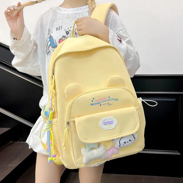 木木兔 书包女高中生轻便减负大容量初中生小学生  经典时尚小众设计 高级感 休闲拉链开合 尼龙布 双肩包 常规 米白色