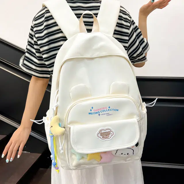木木兔 书包女高中生轻便减负大容量初中生小学生  经典时尚小众设计 高级感 休闲拉链开合 尼龙布 双肩包 常规 米白色
