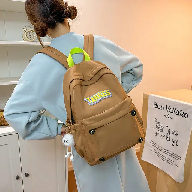 木木兔 轻便减压书包女高中生大容量减负初中小学生  经典时尚小众设计 高级感 休闲拉链开合  牛津纺 双肩包 常规 黑色