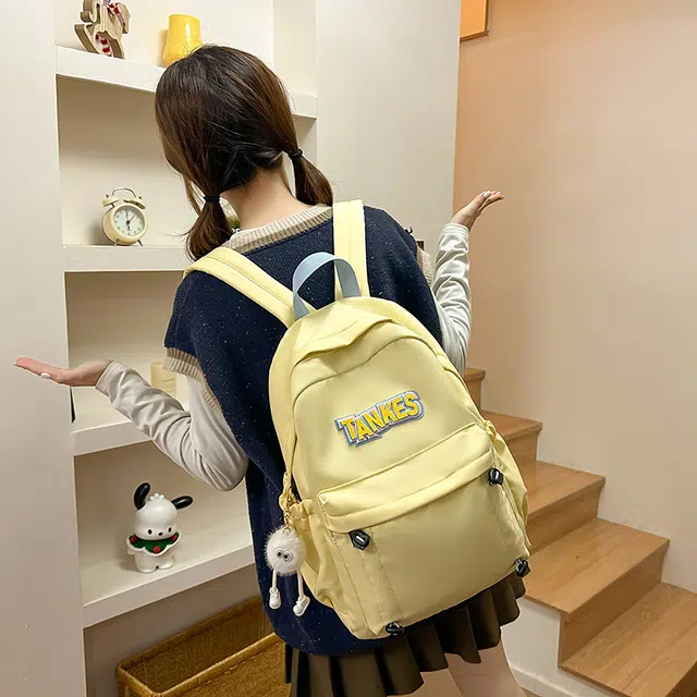 木木兔 轻便减压书包女高中生大容量减负初中小学生  经典时尚小众设计 高级感 休闲拉链开合  牛津纺 双肩包 常规 黑色