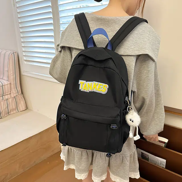 木木兔 轻便减压书包女高中生大容量减负初中小学生  经典时尚小众设计 高级感 休闲拉链开合  牛津纺 双肩包 常规 黑色