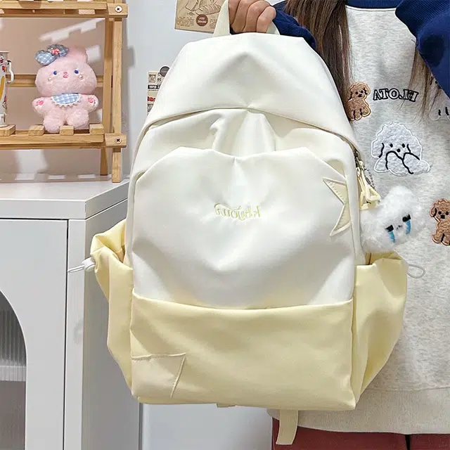木木兔 书包女生初中生超大容量中学生高中小学生轻便减负  经典时尚小众设计 高级感 休闲拉链开合 尼龙布 双肩包 常规 黄色