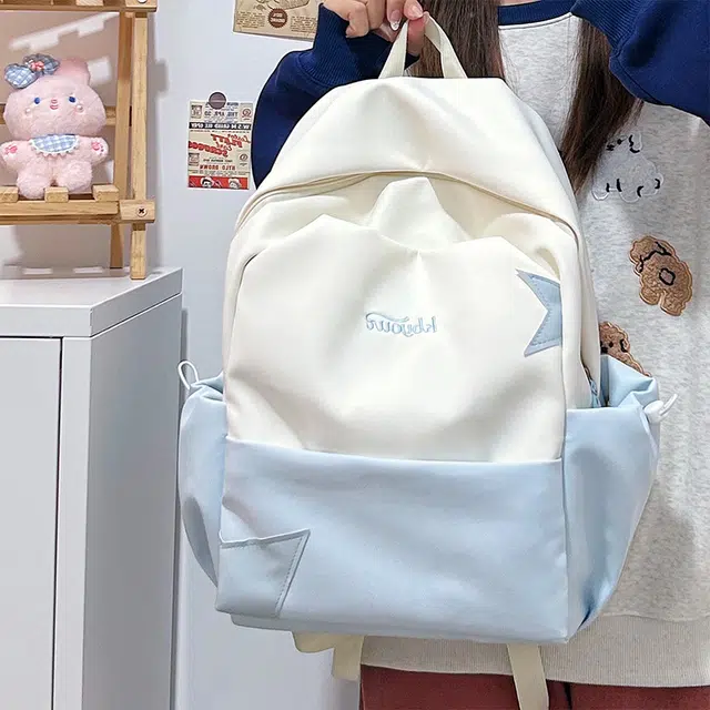 木木兔 书包女生初中生超大容量中学生高中小学生轻便减负  经典时尚小众设计 高级感 休闲拉链开合 尼龙布 双肩包 常规 黄色