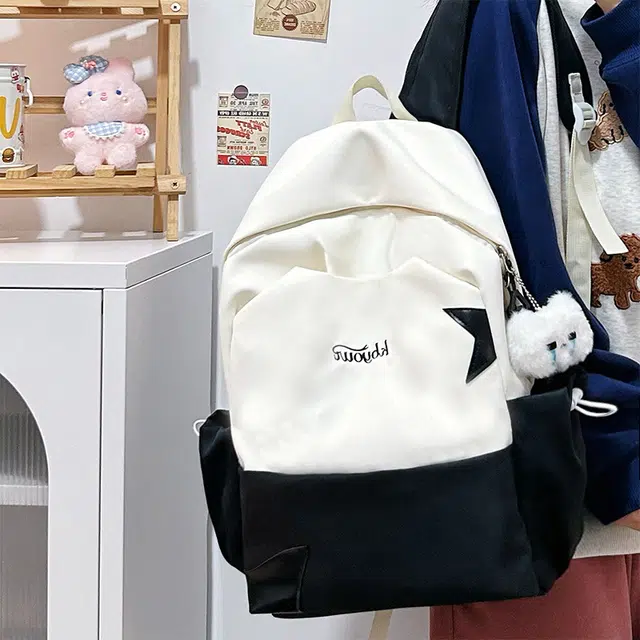 木木兔 书包女生初中生超大容量中学生高中小学生轻便减负  经典时尚小众设计 高级感 休闲拉链开合 尼龙布 双肩包 常规 黄色