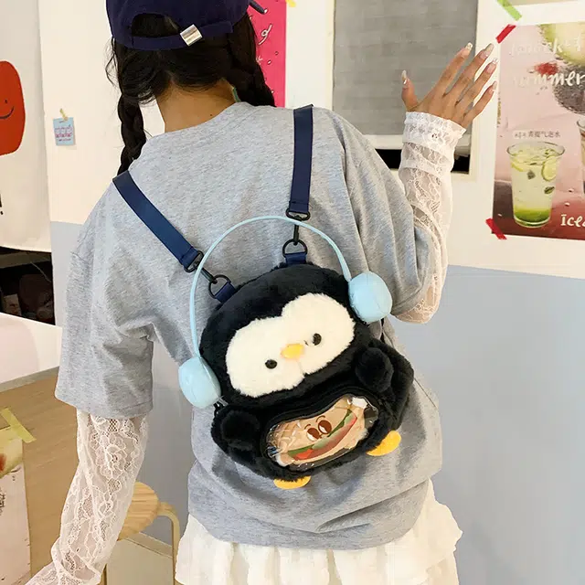木木兔 书包女小学生轻便 初中生超大容量 高中生包包 高颜值 经典时尚小众设计 高级感 休闲拉链开合 牛津纺 双肩包 常规 企鹅