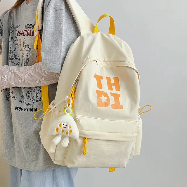 木木兔 书包女生初中生超大容量中学生高中小学生轻便减负  经典时尚小众设计 高级感 休闲拉链开合 尼龙布 双肩包 常规 卡其色