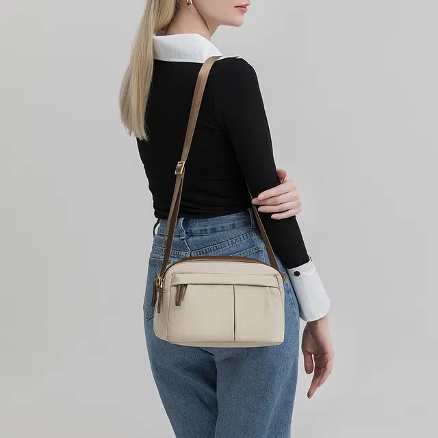 老人头 通勤百搭柔软褶皱设计小众设计感休闲 牛津纺 斜挎包 女款 赫本黑/果仁杏