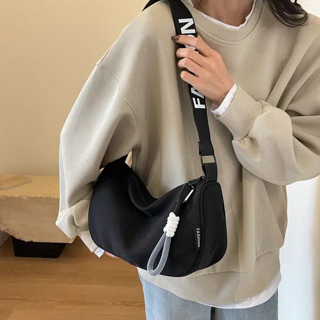 普乐威 高颜值简约时尚百搭小众通勤 布 单肩包 男女同款情侣款 白蓝/白黑/黑色