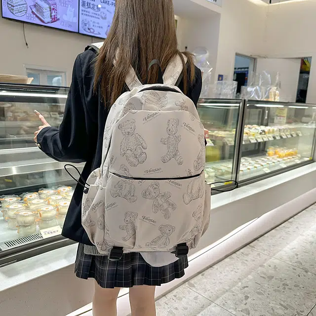 普乐威 高中生大容量轻便时尚潮流简约休闲百搭印花小熊背包大学生书包 尼龙 双肩包 男女同款情侣款 米白色/黑色