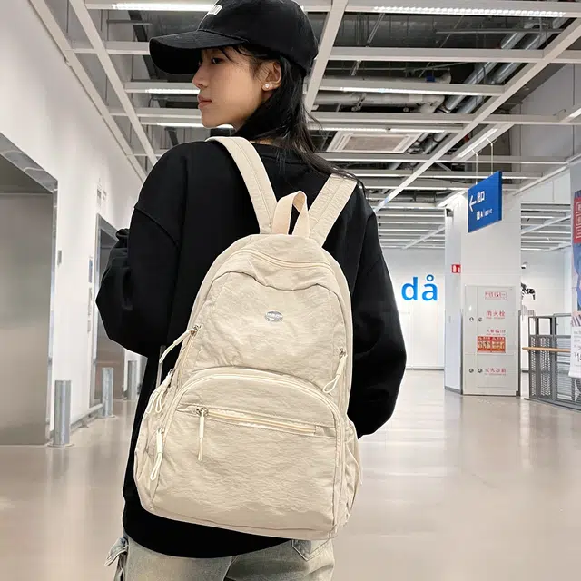 普乐威 高颜值轻便日系书包防泼水多兜电脑通勤百搭旅游 尼龙 背包双肩包 男女同款情侣款 米白色/黑色/卡其色