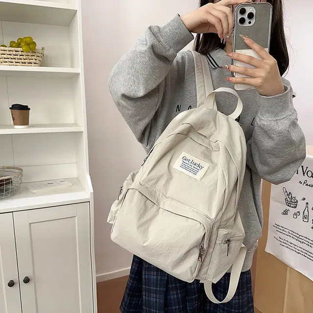 普乐威 韩版简约纯色小众字母书包上课通勤百搭大容量高颜值轻便旅游 尼龙 双肩包 常规 男女同款情侣款 多色