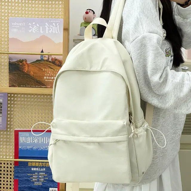 普乐威 韩版日系极简风纯色简约百搭上课通勤书包大容量小众配色轻便旅游 尼龙 双肩包 常规 男女同款情侣款 多色