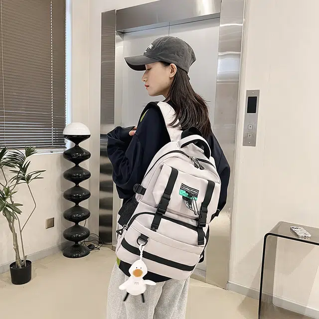 普乐威 简约百搭时尚高颜值多功能短途旅行工装风休闲大容量 尼龙 书包背包双肩包 常规 男女同款情侣款 多色