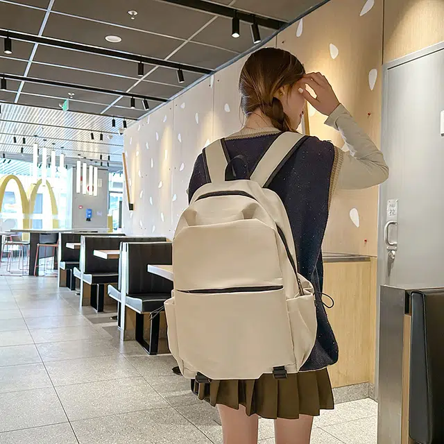 普乐威 日韩纯色简约森女系大容量书包初中生高中生大学生上课通勤百搭高颜值轻便休闲旅游 尼龙 双肩包 常规 男女同款情侣款 多色